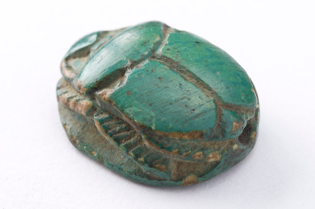 Egyptian green coloured faience scarab beetle amulet.