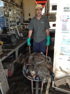 Ewen McPhee removing ruined paper based objects