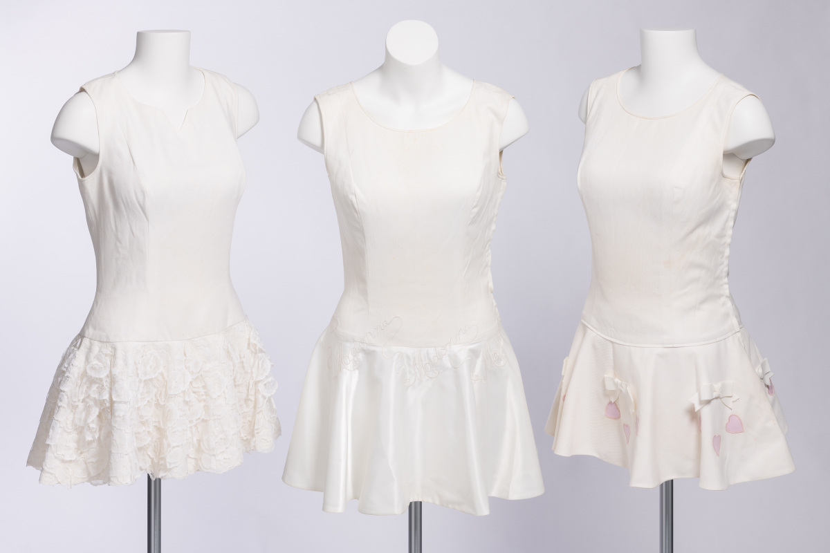 These custom-made white cotton pique tennis dresses, designed by British tennis fashion icon, Teddy Tinling, was worn at Wimbledon in the 1960s by Queensland tennis player and member of the 1962 Australian Women's Tennis Team, Madonna Schacht.